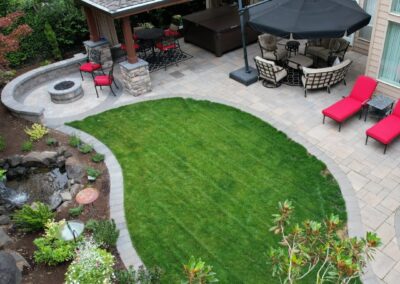 total outdoor living with sod and fire pit